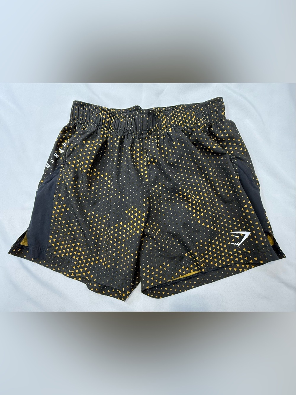 Gymshark Black Shorts with Gold Triangle Print